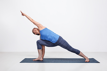 Image showing Woman doing Ashtanga Vinyasa Yoga asana