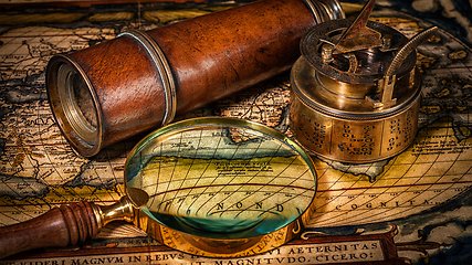 Image showing Old vintage compass on ancient map