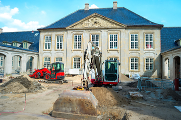 Image showing Street renovation by historical building