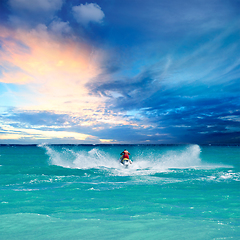 Image showing Man riding jet ski