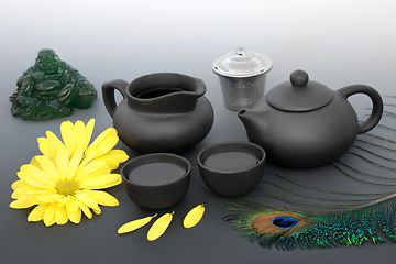 Image showing Traditional Japanese Tea Ceremony with Chrysanthemum Flowers