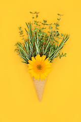 Image showing Surreal Summer Ice Cream Cone Concept with Herbs and Edible Flow
