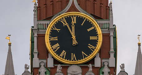 Image showing Moscow Kremlin Main Clock named Kuranti on Spasskaya Tower 12 hours . Red Square.