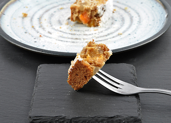 Image showing Christmas stollen on fork and slate