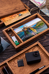 Image showing Wooden photo box with photo from travel