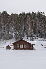 Image showing Winter holiday house in forest.