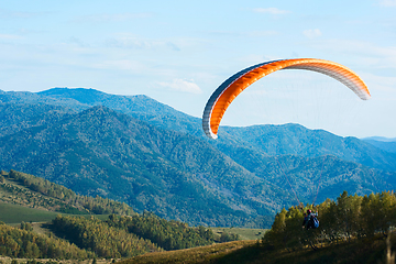 Image showing Paragliding in mountains