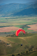 Image showing Paragliding in mountains