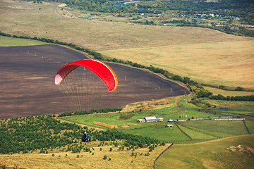 Image showing Paragliding in mountains