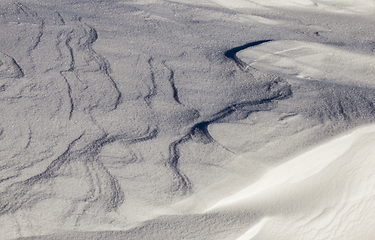 Image showing Deep snowdrifts - deep snowdrifts photographed close-up in sunny weather. Winter season