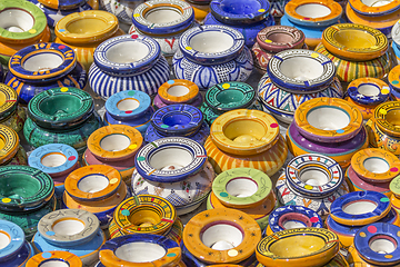 Image showing lots of colorful ashtrays