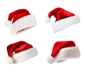 Image showing Santa hats isolated on white