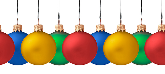 Image showing Row pf hanging Christmas baubles isolated (seamless horizontall