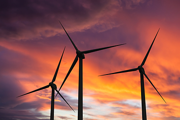 Image showing Wind generator turbines in sky