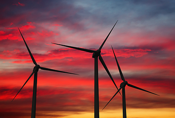 Image showing Wind generator turbines in sky