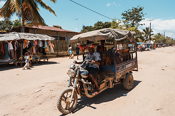 Image showing Malagasy family on vehicle, Madagascar