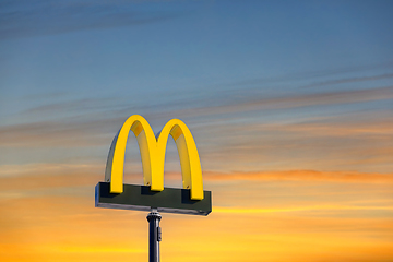 Image showing McDonald's Logo Against Golden Hour Sky