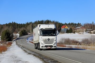 Image showing White Mercedes-Benz Actros Truck Semi Trailer Road Landscape