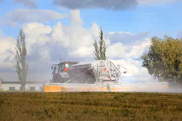 Image showing Tractor Spreading Agricultural Lime 