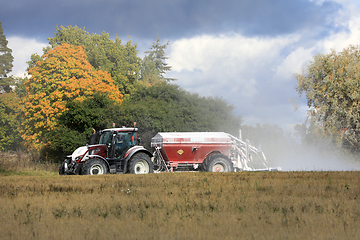 Image showing Valtra Tractor Spreading Agricultural Lime