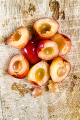 Image showing sliced yellow cherries