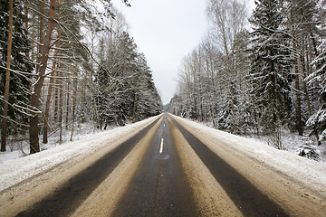 Image showing details of the snow-covered road in forest