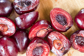 Image showing sliced red sweet cherries