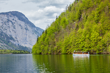 Image showing Tourist boat at alpine mountain