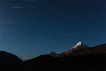 Image showing Star trails above Himalayas mountains.