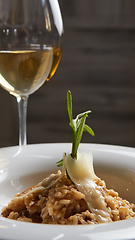 Image showing Italian dish risotto with wild white mushrooms and Parmesan chee