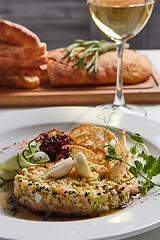 Image showing The salmon tartare with avocado. Shallow dof