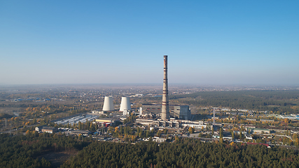 Image showing The thermoelectric plant with big chimneys in forest