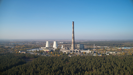 Image showing The thermoelectric plant with big chimneys in forest