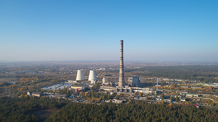 Image showing The thermoelectric plant with big chimneys in forest