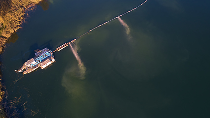 Image showing On the river there are works on extraction of sand. Works dredge