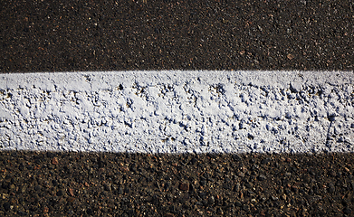 Image showing white road markings asphalted