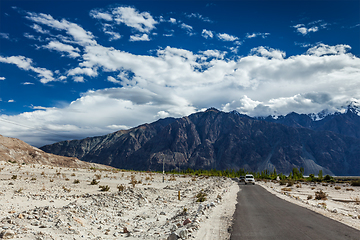 Image showing Road in Himalayas with cars