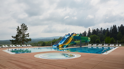 Image showing swimming pool on luxury resort in forest.