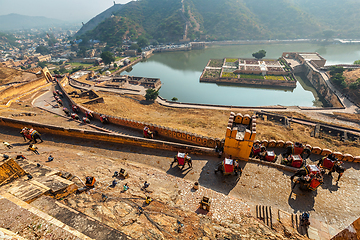 Image showing Tourists riding elephants on ascend to Amer fort