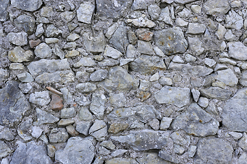 Image showing Old wall from stones of various shapes