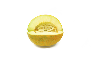 Image showing Cut melon with seeds on white background