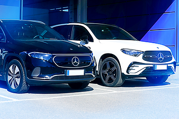 Image showing Two New Luxury Mercedes-Benz SUV Cars in Blue Light