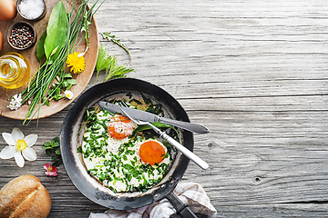 Image showing Fried eggs herbs