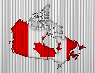 Image showing Map and flag of Canada on corrugated iron