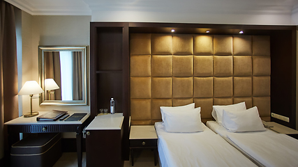 Image showing Two beds in a hotel room. Interior design