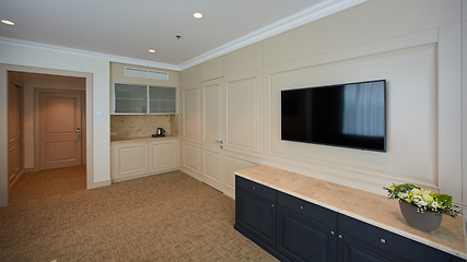Image showing A modern livingroom inside a new flat with TV.