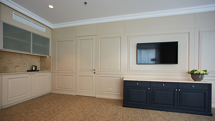 Image showing A modern livingroom inside a new flat with TV.