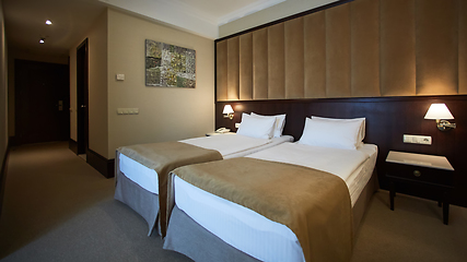 Image showing Two beds in a hotel room. Interior design