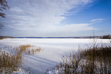 Image showing winter landscape with snow covered lake