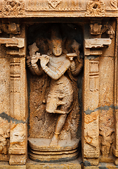 Image showing Krishna bas relief in Hindu temple. Sri Ranganathaswamy Temple. Tiruchirappalli, Tamil Nadu, India